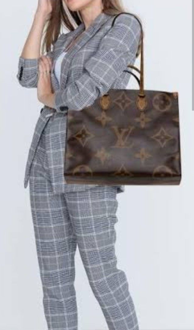 Louis Vuitton Monogram Giant Onthego Tote Bag (Category: Luxury Bags & Wallets) located in Taguig. Submitted by divine_kitty (Listing ID 1460917433, Image 2). Description: - Features the iconic Giant Monogram print - Spacious interior with a vibrant red lining - Comfortable shoulder straps for easy carrying - Ideal for everyday use -great for travels -aura kung aura .