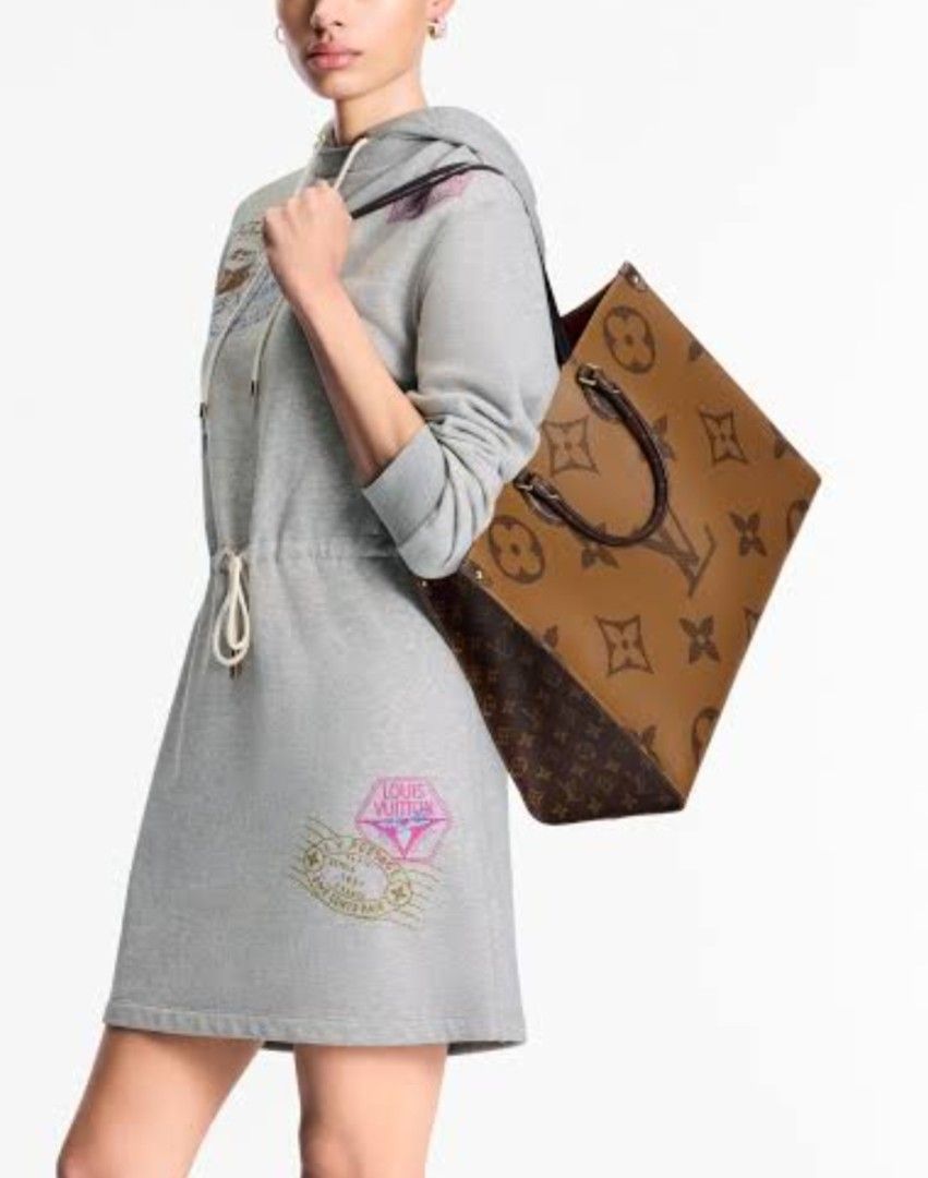 Louis Vuitton Monogram Giant Onthego Tote Bag (Category: Luxury Bags & Wallets) located in Taguig. Submitted by divine_kitty (Listing ID 1460917433, Image 3). Description: - Features the iconic Giant Monogram print - Spacious interior with a vibrant red lining - Comfortable shoulder straps for easy carrying - Ideal for everyday use -great for travels -aura kung aura .