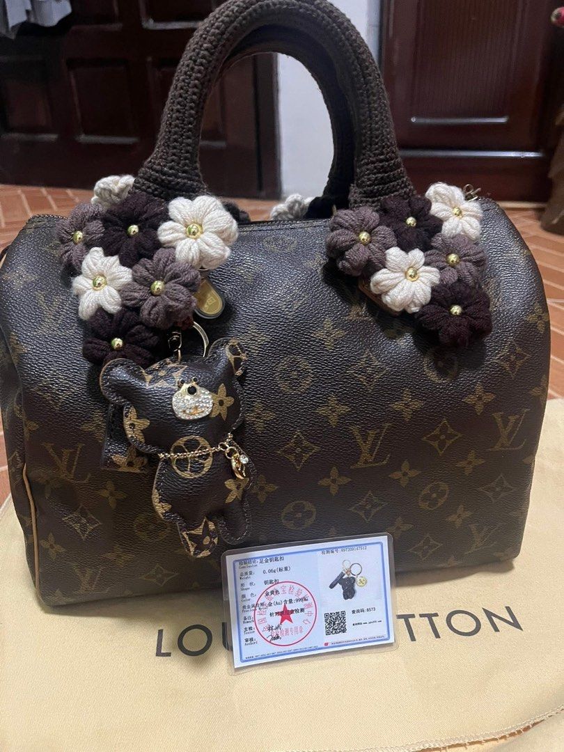 Louis Vuitton Monogram Speedy Bag with Bear Charm (Category: Luxury Bags & Wallets) located in Manila. Submitted by anjucarl (Listing ID 1460793206, Image 1). Description: - Authentic Louis Vuitton Speedy Bag - Classic Monogram Canvas - Unique Brown Crochet Handles - Adorable Bear Charm Included - Charming Floral Embellishments - Clean Interior - Date Code: SP0944 - Ideal for Everyday Use.