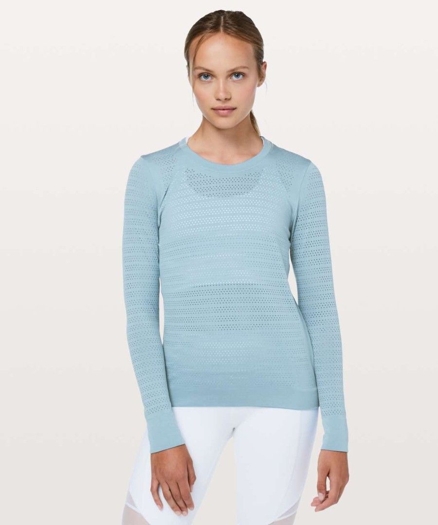 Lululemon breeze by Long sleeve (dot 8) (Category: Activewear) located in Arayat. Submitted by keenwolf-a7b5 (Listing ID 1460915267, Image 1). Description: - Light blue Lululemon long sleeve top - dot 8 - Features a perforated pattern for enhanced breathability - Classic crew neck design - Versatile for workouts or everyday casual wear - Lightweight and comfortable fabric.
