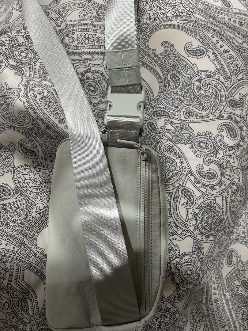 Lululemon Everywhere Belt Bag Light Grey (Category: Cross-body Bags) located in Manila. Submitted by riri_tris_preloved (Listing ID 1460769838, Image 3). Description: - Lululemon Everywhere Belt Bag - Color: Light Grey or Teal - Adjustable strap for crossbody or waist wear - Main zippered compartment - Smaller front zippered pocket - Interior mesh pockets for organization - Ideal for everyday use and workouts - NEVER USED JUST REMOVED THE PACKAGI