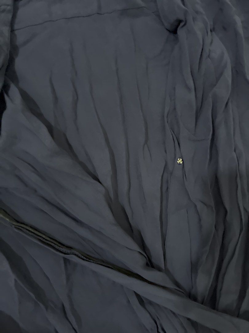 Mango Blue Jumpsuit (Category: Jumpsuits) located in Pasig City. Submitted by slr1949 (Listing ID 1460917378, Image 2). Description: Blue jumpsuit with garterized waist Missing button to close the neckline .