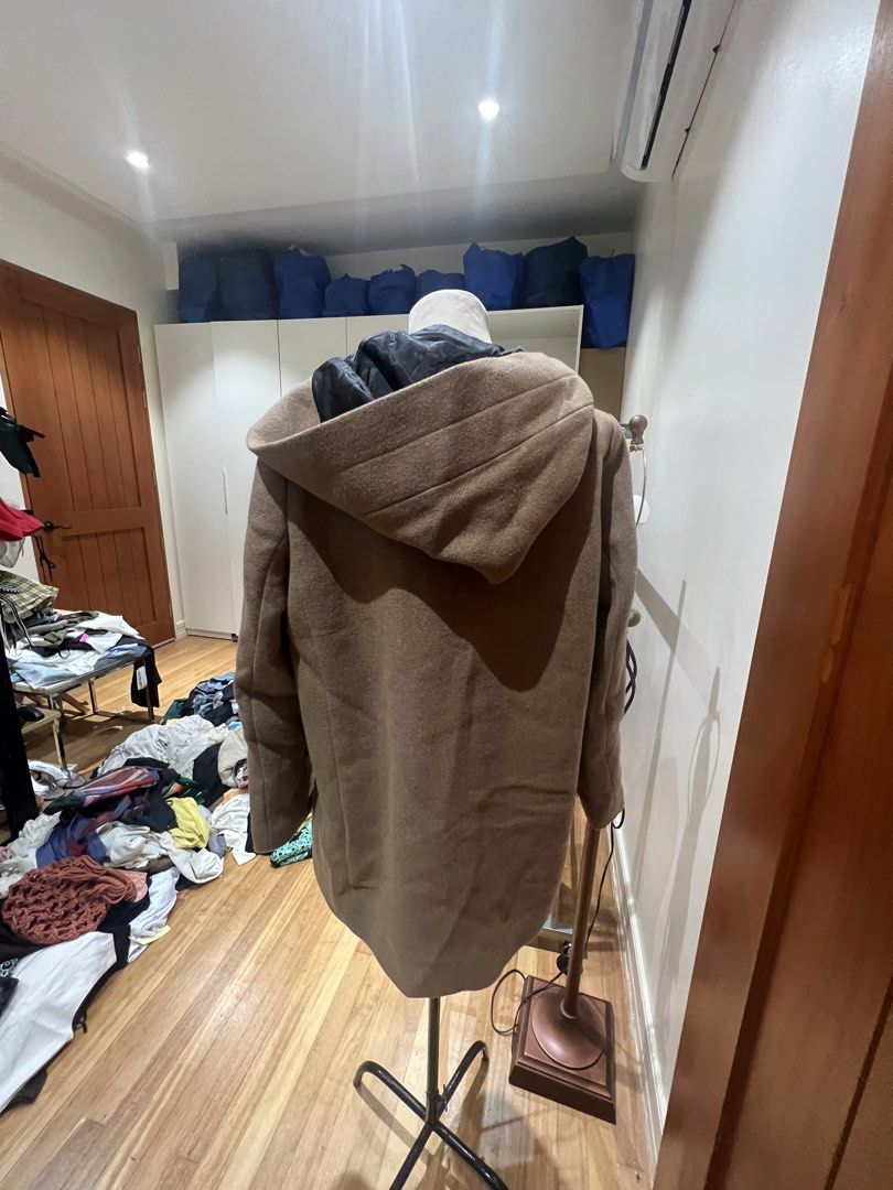 Mango Casual Wool Blend Hooded Coat (Category: Coats, Jackets and Outerwear) located in Quezon City. Submitted by iminquezoncity (Listing ID 1460809628, Image 2). Description: - Brand: Mango Casual - Color: Brown - Style: Hooded coat - Material: Wool blend - Closure: Zip-up front - Features: Pockets - Estimated Size: XS - Ideal for: Cooler weather, easy styling.
