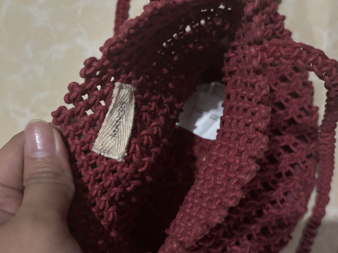 MANGO Maroon Woven Macrame Shoulder Bag (Category: Shoulder Bags) located in Quezon City. Submitted by Misschief101 (Listing ID 1460829792, Image 3). Description: - Cute maroon woven bag - Macrame style with braided straps - Ideal for casual outings or beach days - Open weave design (best for items that won't fall through).