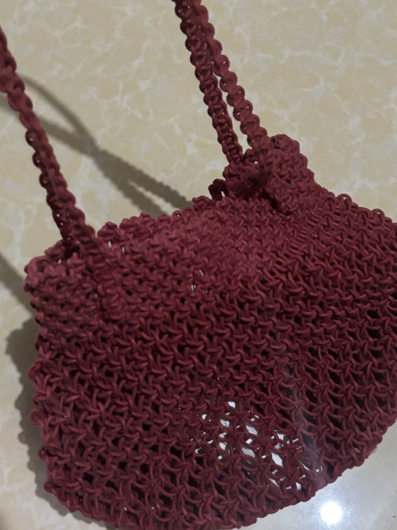 MANGO Maroon Woven Macrame Shoulder Bag (Category: Shoulder Bags) located in Quezon City. Submitted by Misschief101 (Listing ID 1460829792, Image 2). Description: - Cute maroon woven bag - Macrame style with braided straps - Ideal for casual outings or beach days - Open weave design (best for items that won't fall through).