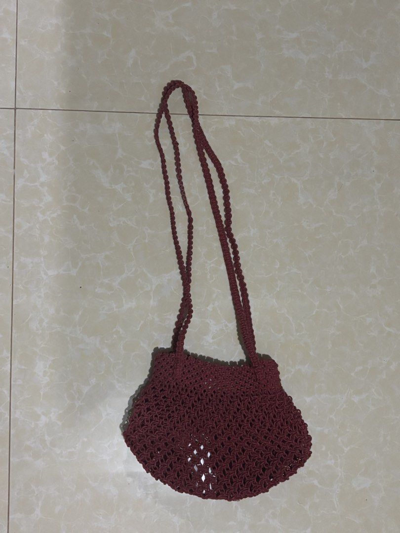 MANGO Maroon Woven Macrame Shoulder Bag (Category: Shoulder Bags) located in Quezon City. Submitted by Misschief101 (Listing ID 1460829792, Image 1). Description: - Cute maroon woven bag - Macrame style with braided straps - Ideal for casual outings or beach days - Open weave design (best for items that won't fall through).