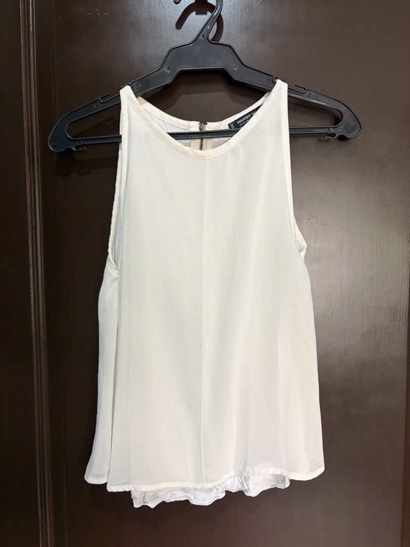 Mango White Sleeveless (Category: Blouses) located in Manila. Submitted by urbanwear (Listing ID 1460765268, Image 1). Description: .