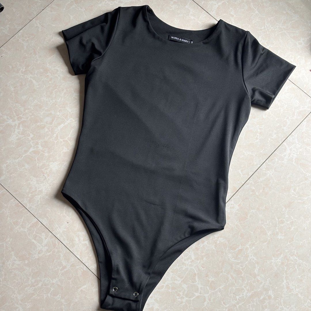 Maria & Mary Short Sleeve Bodysuit (Category: Others Tops) located in Manila. Submitted by glenkm (Listing ID 1460788430, Image 3). Description: - Basic short sleeve bodysuit - Stretchy and comfortable material - Convenient snap closure at the bottom - Available colors: Rust, Blue, Tan, Black Take all for 300.