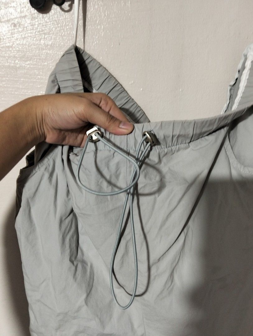 MASANON Grey Drawstring Elastic Waist Shorts, Windbreaker (Category: Shorts) located in Manila. Submitted by oddhorse_8ada97 (Listing ID 1460726428, Image 1). Description: - Brand: MASANON - Color: Grey - Features: Elastic waistband with drawstring, two side pockets - Fit: Relaxed - Fabric: Lightweight and crinkly - Style: Casual wear, easy to wear and adjust good for hiking.