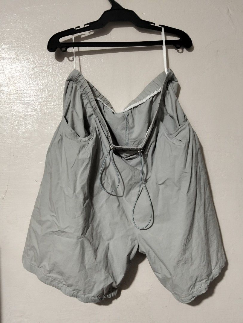 MASANON Grey Drawstring Elastic Waist Shorts, Windbreaker (Category: Shorts) located in Manila. Submitted by oddhorse_8ada97 (Listing ID 1460726428, Image 2). Description: - Brand: MASANON - Color: Grey - Features: Elastic waistband with drawstring, two side pockets - Fit: Relaxed - Fabric: Lightweight and crinkly - Style: Casual wear, easy to wear and adjust good for hiking.