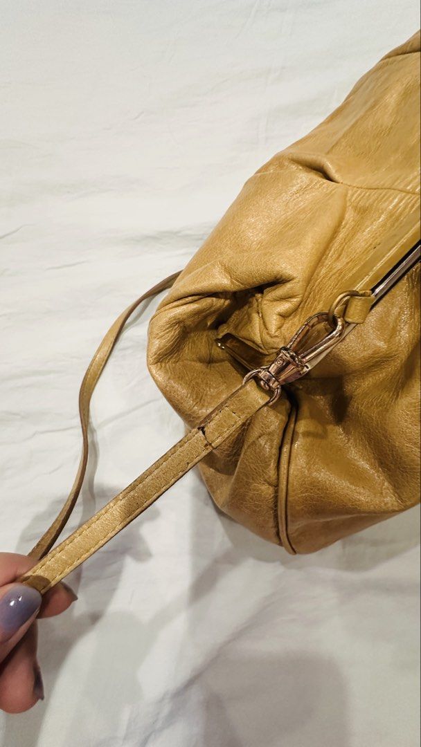 Massimo Dutti Leather Bag (Category: Cross-body Bags) located in Manila. Submitted by sagecuration (Listing ID 1460835316, Image 3). Description: Brand: Massimo Dutti Material: 100% leather Color: Caramel Condition: Slight stains on strap Includes dust bag MOP: bank deposit/gcash SF: c/o buyer Location: Paco, Manila.