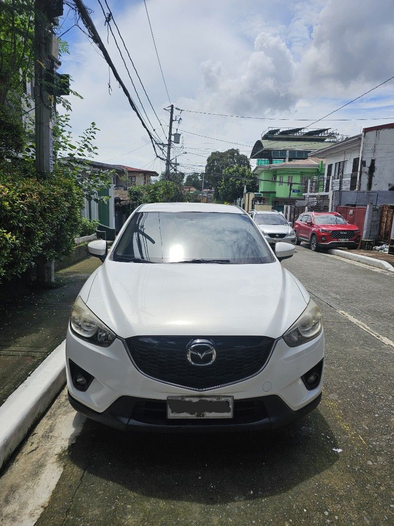 Mazda CX-5 2.0 2WD Standard Auto (Category: Used Cars) located in Pasig City. Submitted by abeljohn (Listing ID 1460815063, Image 2). Description: Mazda CX-5 Color White Monday coding AT Gasoline Low mileage - 70k+ New tires and battery Registered Never flooded Fresh and ready for long drives See to appreciate.