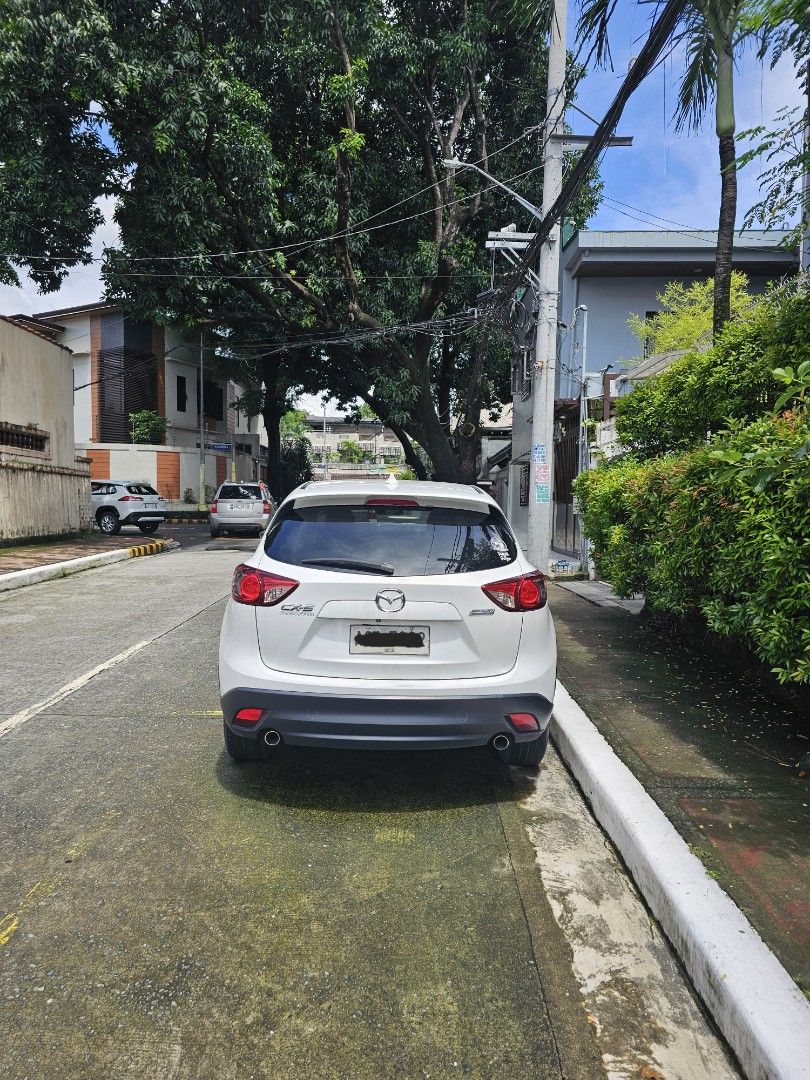 Mazda CX-5 2.0 2WD Standard Auto (Category: Used Cars) located in Pasig City. Submitted by abeljohn (Listing ID 1460815063, Image 3). Description: Mazda CX-5 Color White Monday coding AT Gasoline Low mileage - 70k+ New tires and battery Registered Never flooded Fresh and ready for long drives See to appreciate.