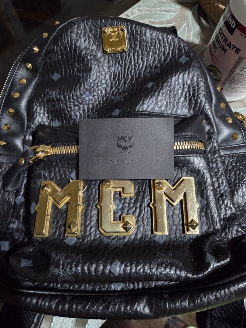 MCM Backpack (Category: Backpacks) located in Quezon City. Submitted by mkl.p (Listing ID 1460762797, Image 2). Description: - leather with gold buckle 2017 - 9/10 condition - dust bag & card included - if interested, pm me your photo requests - 3x used loc: san juan city.