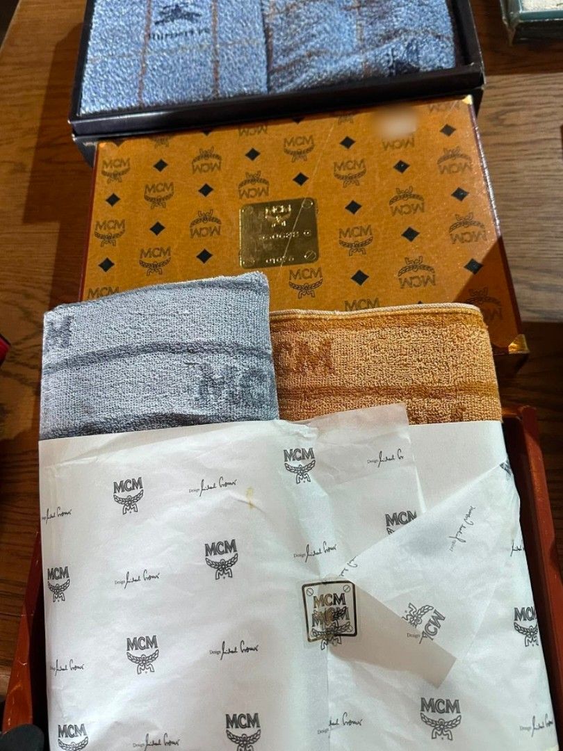MCM Towel Set - Luxury Design (Category: Bedding & Towels) located in Bulacan. Submitted by hunterherojapanjdm (Listing ID 1460898807, Image 1). Description: - Authentic MCM towel set - Includes one large towel and one hand towel - Elegantly wrapped in MCM tissue paper - Comes in a branded MCM box - Ideal for gifting or personal indulgence.