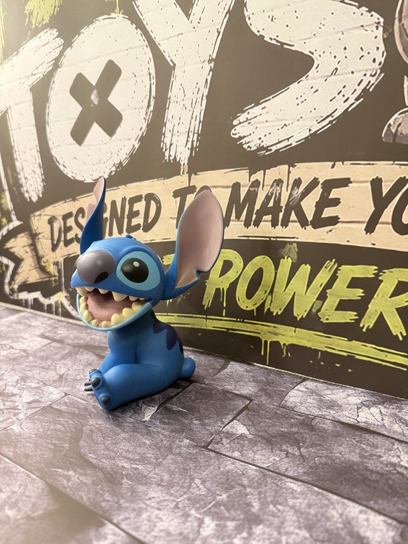 Medicom Stitch Figurine Toy (Category: Designer & Blind Box Toys) located in Taguig. Submitted by fart_toys (Listing ID 1460903679, Image 2). Description: - Adorable Stitch figurine - Perfect for Disney fans and collectors - Ideal for display or adding to a collection - A fun character piece for enthusiasts.