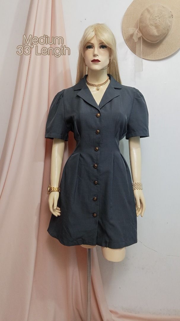 Medium Grey Button-Up Puff Sleeve Dress (Category: Dresses) located in Baguio. Submitted by anastasia.f0x (Listing ID 1460839666, Image 1). Description: - Stylish grey dress - Features elegant puff sleeves - Button-up front for a classic look - Collared neckline - Fitted waist for a flattering silhouette - Dress length: 33 inches.