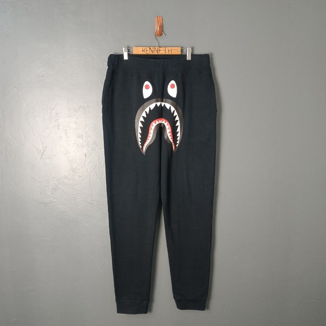 Men's - Bape (Category: Joggers) located in Bacolod City. Submitted by drop.ph (Listing ID 1460812895, Image 2). Description: Bape - Shark Sweatpants Authentic *Fits 34-36, Length - 45.5 *Excellent cloth *Minor Crack on print *Price: 3,500php *Add SF if outside Bacolod City .