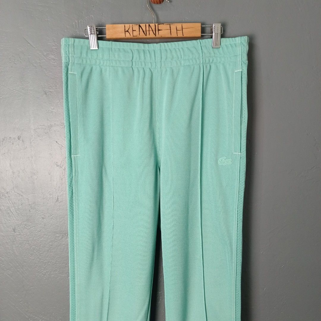 Men's - Lacoste - Side Taped (Category: Joggers) located in Bacolod City. Submitted by drop.ph (Listing ID 1460839381, Image 1). Description: Lacoste - Logo Taped Track Pants Authentic *Fits 32-34, Length - 40, Leg Opening - 7.5 *Excellent cloth *Small stain *Price: 2,500php *Add SF if outside Bacolod City.