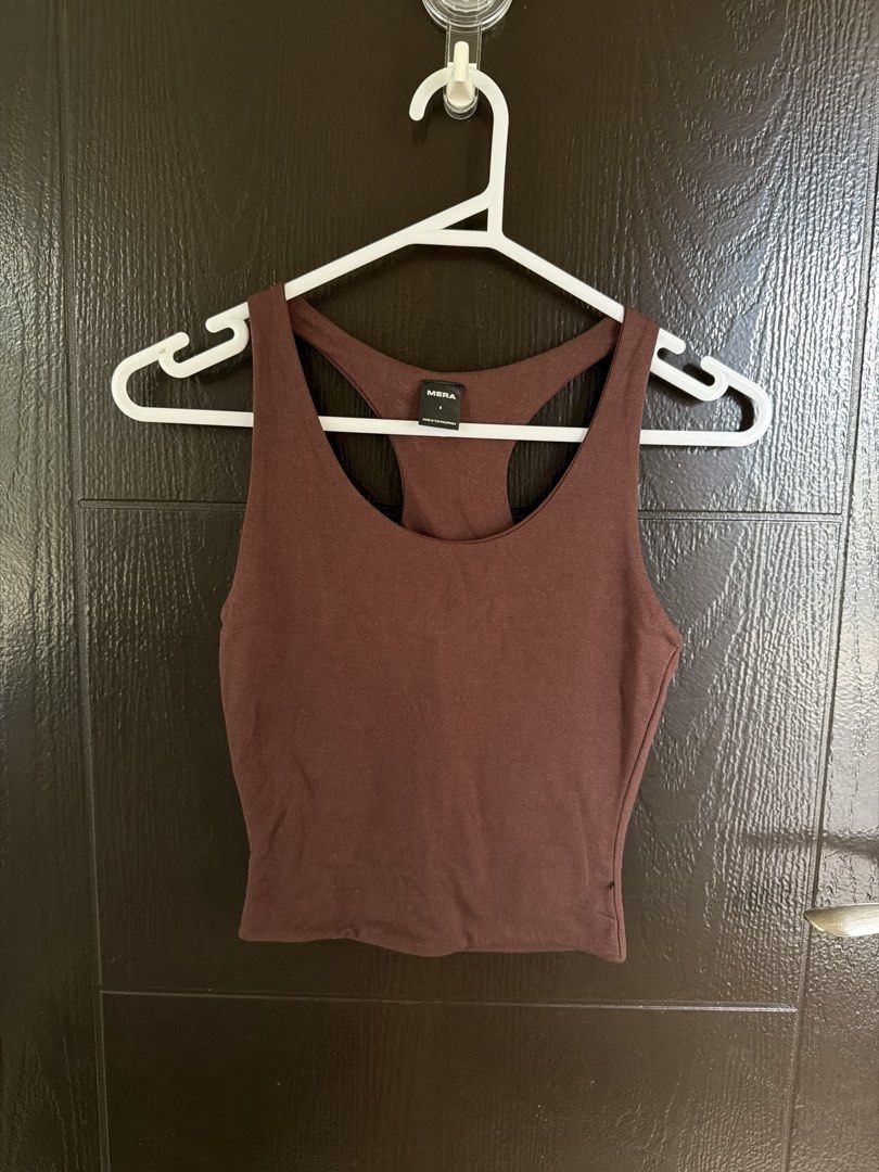 MERA Brown Racerback Tank Top Size S (Category: Sleeveless) located in Paranaque City. Submitted by shopnrepeat_ (Listing ID 1460818206, Image 1). Description: used once - Brand: MERA - Color: Brown - Style: Racerback Tank Top - Origin: Made in the Philippines - Features: Comfortable, versatile, simple design - Perfect for: Workouts, casual wear, everyday use.