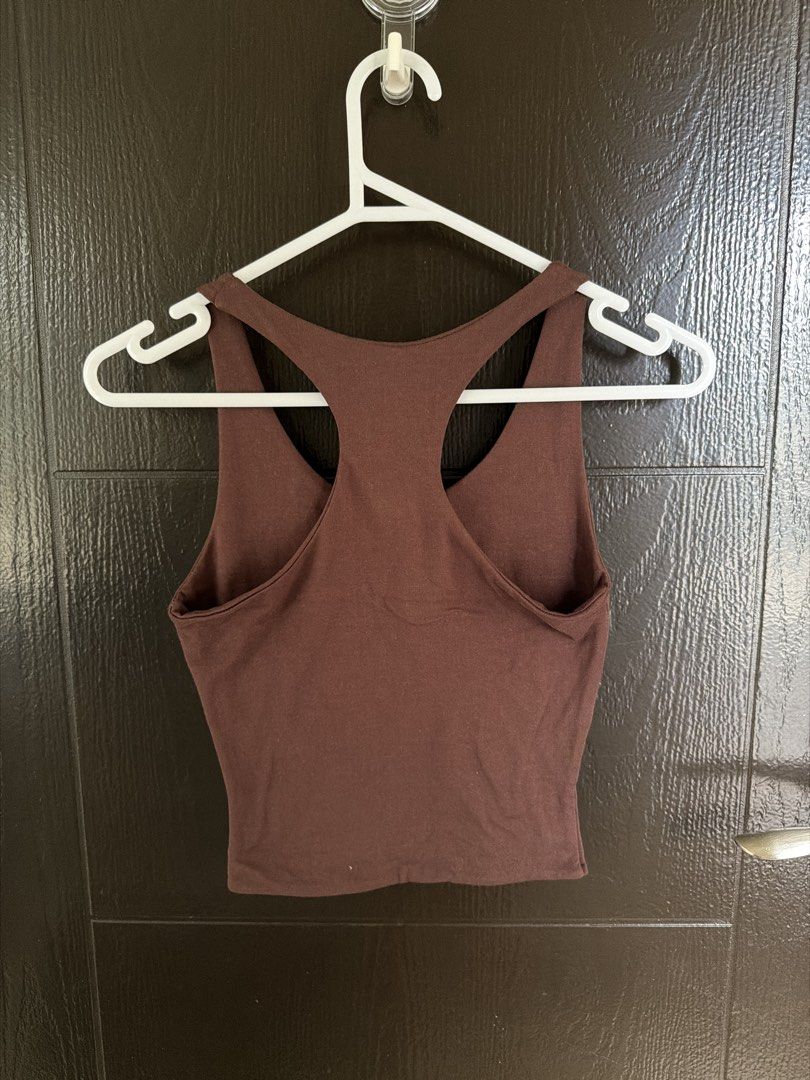 MERA Brown Racerback Tank Top Size S (Category: Sleeveless) located in Paranaque City. Submitted by shopnrepeat_ (Listing ID 1460818206, Image 3). Description: used once - Brand: MERA - Color: Brown - Style: Racerback Tank Top - Origin: Made in the Philippines - Features: Comfortable, versatile, simple design - Perfect for: Workouts, casual wear, everyday use.