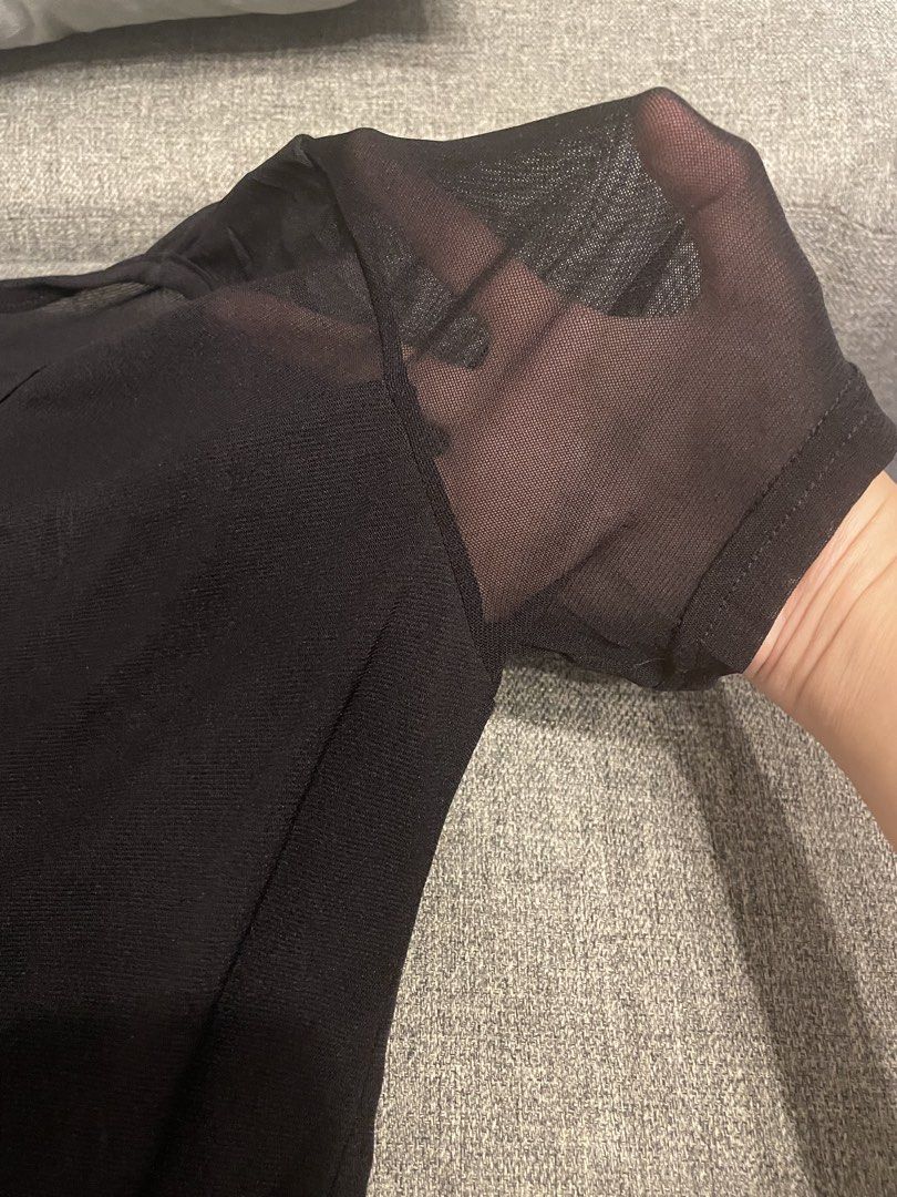 Mesh Sleeve Sheer Top (Category: Blouses) located in Quezon City. Submitted by mfordma (Listing ID 1460910358, Image 2). Description: BRAND NEW Originally bought for 560.00 Doing a little closet decluttering! ✨ Letting go of some pieces that are still in great condition and looking for a new home. 🤍 Brand: BKK Size: Free size Color: Black Description: - Very stretchable stylish black top - Features sheer mesh sleeves and neckline detail - Made f