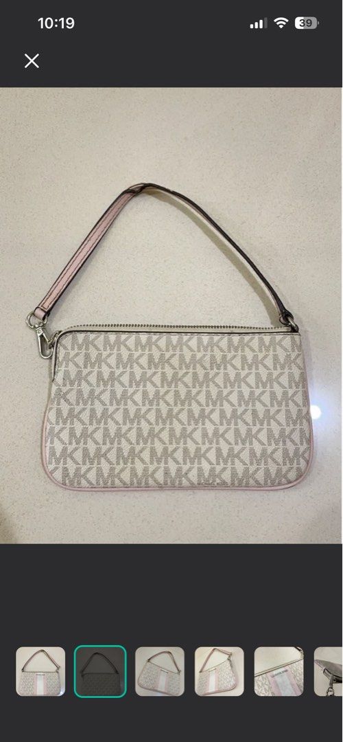 Michael Kors Wristlet Original (Category: Purses & Pouches) located in Cagayan de Oro. Submitted by suta.__.ph (Listing ID 1460816996, Image 2). Description: .