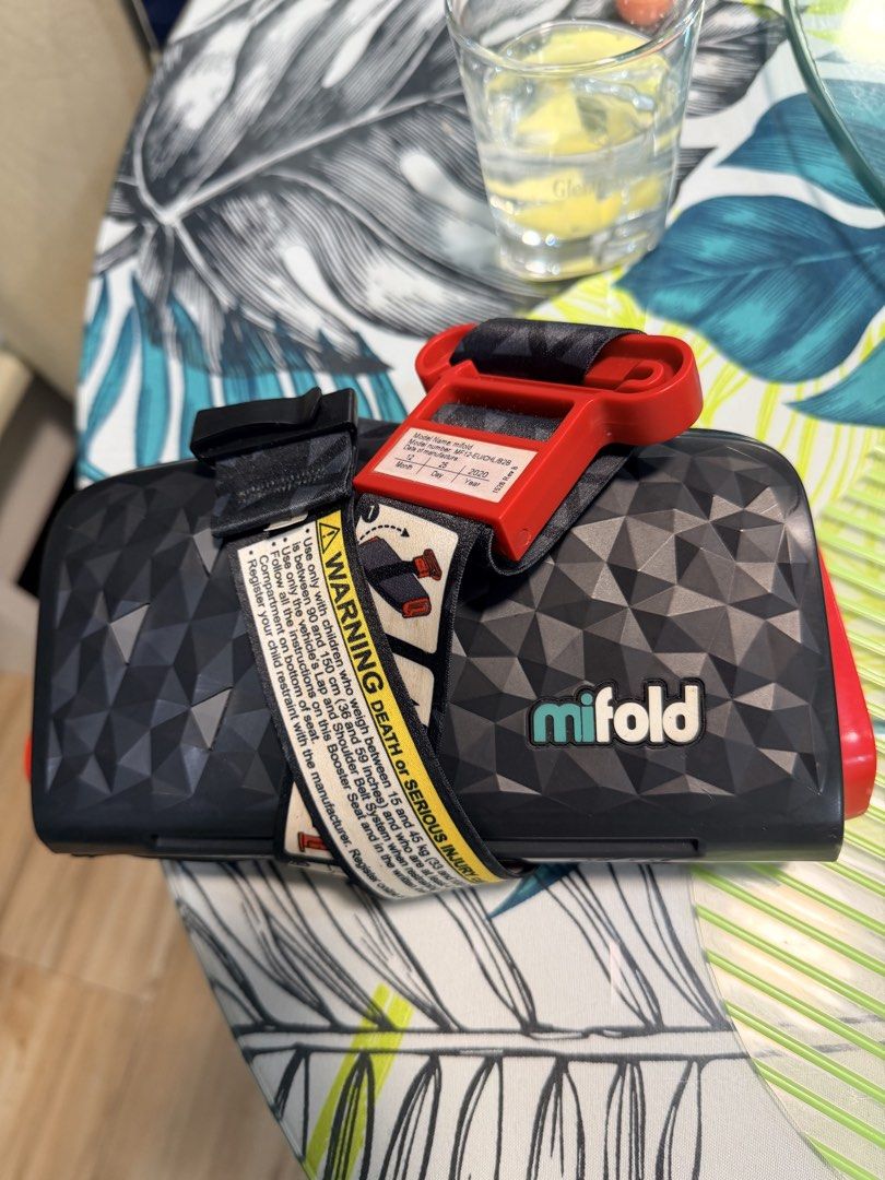 mifold Grab-and-Go Booster Seat (Category: Car Seats) located in San Juan City. Submitted by declutter_stuffph (Listing ID 1460727841, Image 1). Description: - mifold booster seat - perfect for travel! - Super compact and portable design - Incredibly easy to use - Suitable for children weighing 15-45 kg (33-100 lbs) - Model number: 4/04 - Proudly made in China - IMPORTANT: Please read all safety instructions before use..