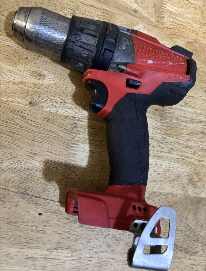 Milwaukee M18 FUEL Brushless Hammer Drill (Category: Construction Tools & Equipment) located in San Juan City. Submitted by jeruest888 (Listing ID 1460832602, Image 2). Description: - Milwaukee M18 FUEL Brushless Hammer Drill - Color: Red and Black - Condition: Works great, shows normal signs of use (scuffs/marks) - Ready for your next project! - IMPORTANT: Tool only, battery and charger NOT included..