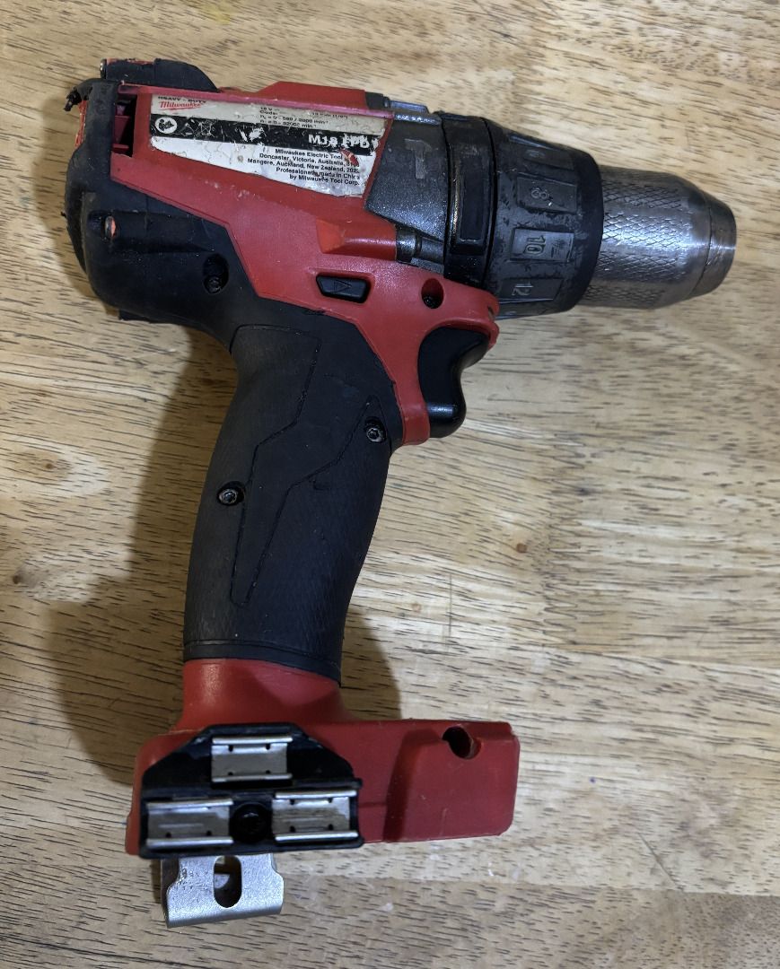Milwaukee M18 FUEL Brushless Hammer Drill (Category: Construction Tools & Equipment) located in San Juan City. Submitted by jeruest888 (Listing ID 1460832602, Image 1). Description: - Milwaukee M18 FUEL Brushless Hammer Drill - Color: Red and Black - Condition: Works great, shows normal signs of use (scuffs/marks) - Ready for your next project! - IMPORTANT: Tool only, battery and charger NOT included..