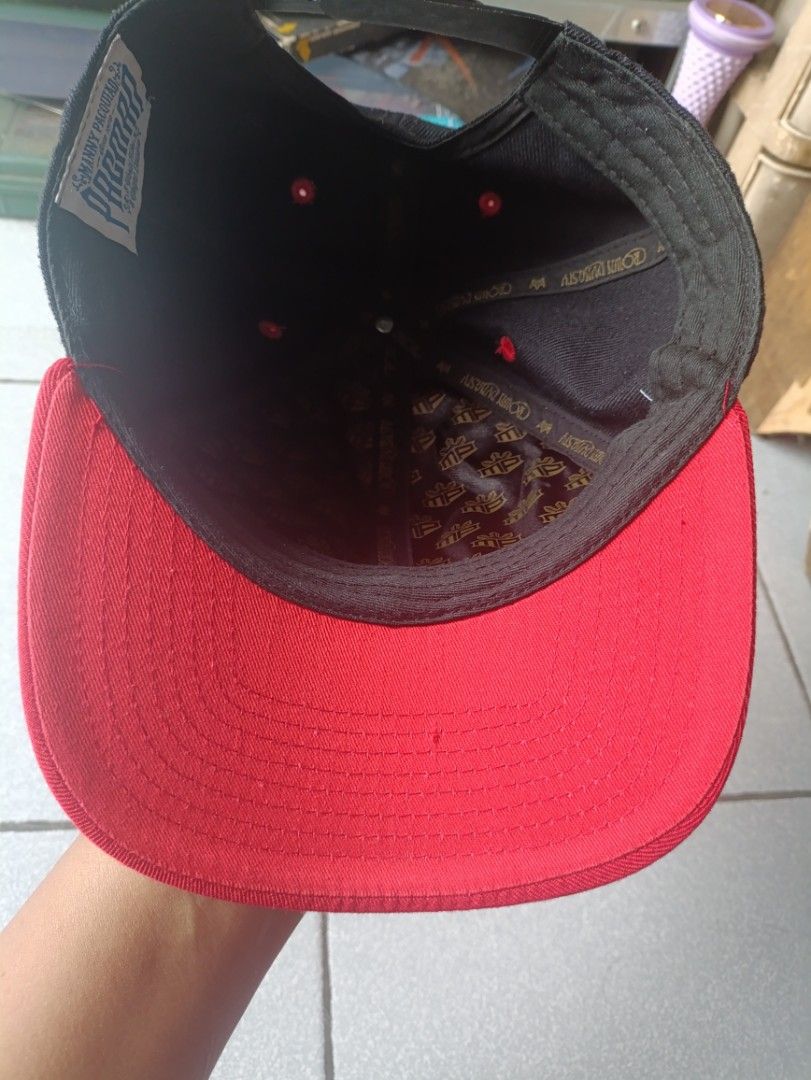 MINDSTYLE MANNY PACQUIAO SNAPBACK CAP (Category: Caps & Hats) located in Quezon City. Submitted by collectandselect (Listing ID 1460752031, Image 3). Description: - Black and red snapback cap - "Manny Pacquiao" and "Pacman" embroidery in gold - "8 World Titles & 8 Weight Divisions" text embroidered - Crown Dynasty branding inside - Adjustable strap at the back Made by MINDSTYLE.