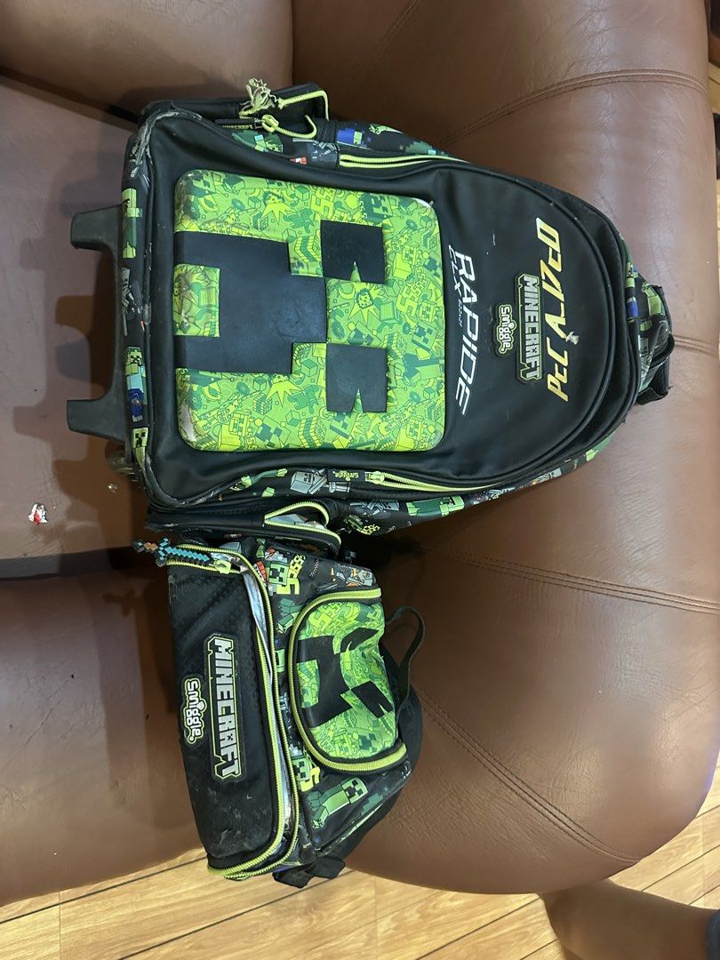 Minecraft Rapide Rolling Backpack and Pencil Case Set (Category: Babies & Kids Fashion) located in Quezon City. Submitted by mthereser43807 (Listing ID 1460758566, Image 1). Description: - Cool Minecraft rolling backpack with wheels - Comes with a matching pencil case - Perfect for school or travel.
