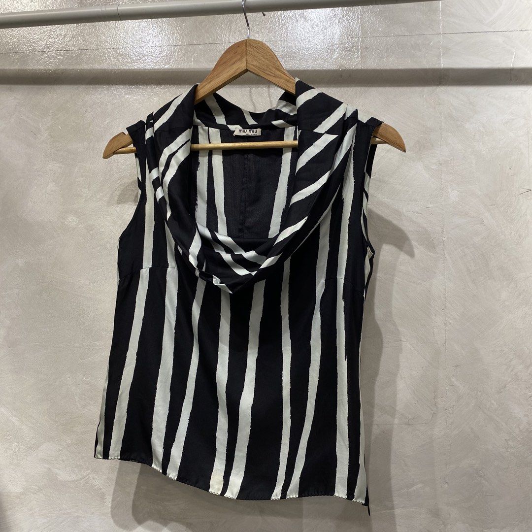 Miumiu Prada FW/03 Draped Neckline Top (Category: Luxury Apparel) located in Quezon City. Submitted by rebirthalley (Listing ID 1460855719, Image 3). Description: Width-16 Length-17 Hem-15.5 Excellent Condition No flaws.