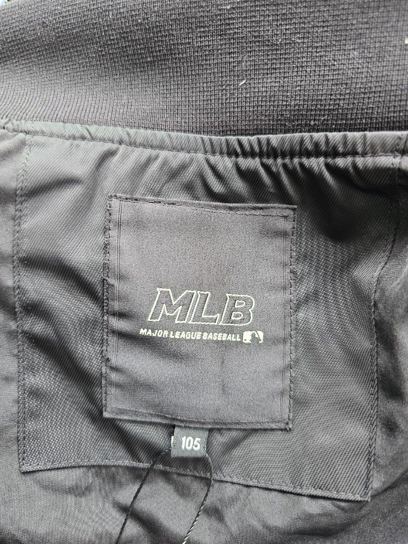 MLB New York Yankees long bomber jacket (Category: Coats, Jackets and Outerwear) located in Baguio. Submitted by kayeonlineshop (Listing ID 1460796889, Image 3). Description: -black MLB New York Yankees long bomber jacket featuring a distinctive chest patch -measurements included in the photos.