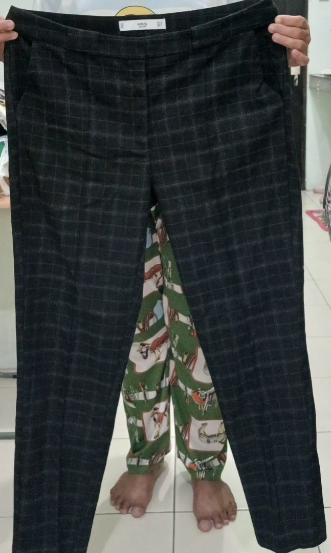 MNG Checked Trousers (Category: Other Bottoms) located in Mandaluyong City. Submitted by gantan.tree (Listing ID 1460902537, Image 1). Description: Mango checked trousers -Color: dark gray - Classic straight leg cut - Comfortable for everyday wear - Versatile: perfect for work or casual outings - Easy to pair with various tops MOP: cash/bank transfer/Gcash (# under About).