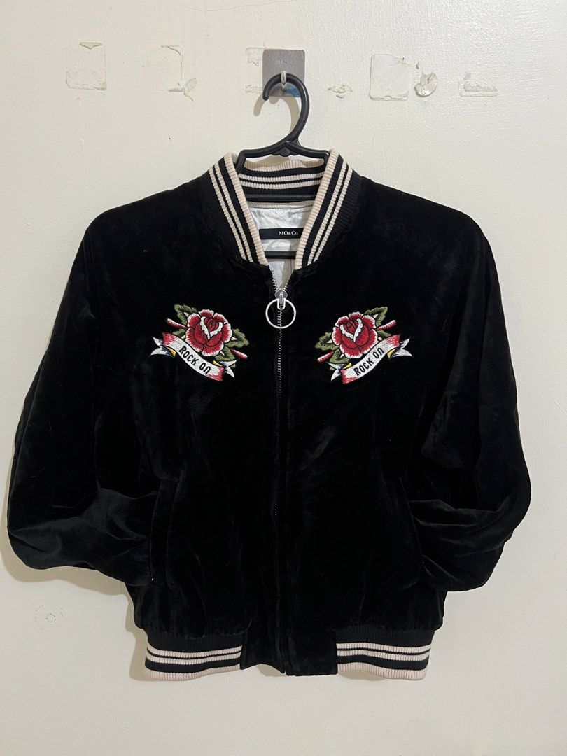 MO&Co. Black Velvet Bomber Jacket Men (Category: Coats, Jackets and Outerwear) located in San Jacinto. Submitted by rex_finds (Listing ID 1460772888, Image 1). Description: MO&Co. Velvet Varsity Jacket Women Front and back embroidery Premium Jacket Heavy duty YKK Zipper Size: Medium to Semi Large Best fit: Semi Large Dimes: 19x23 inches Arm length: 20 inches Jacket is unisex Price is negotiable Feel free to give a reasonable offer PM for more inf