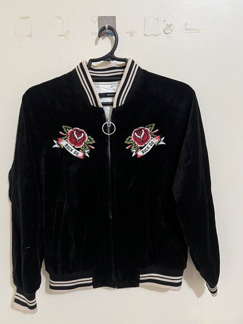 MO&Co. Black Velvet Bomber Jacket Men (Category: Coats, Jackets and Outerwear) located in San Jacinto. Submitted by rex_finds (Listing ID 1460772888, Image 3). Description: MO&Co. Velvet Varsity Jacket Women Front and back embroidery Premium Jacket Heavy duty YKK Zipper Size: Medium to Semi Large Best fit: Semi Large Dimes: 19x23 inches Arm length: 20 inches Jacket is unisex Price is negotiable Feel free to give a reasonable offer PM for more inf