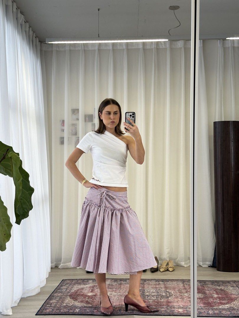 Mode Mischief Costes Midi Skirt (Category: Skirts) located in Quezon City. Submitted by andreasclosetisfull (Listing ID 1460750685, Image 3). Description: OG PRICE: ₱8,800 PRICE: ₱7,900 BRAND: Mode Mischief (Bought it in Melbourne Pop Up) COLOR: Pink Gingham Plaid SIZE: XS (but can fit S cus straps are adjustable) MOP: BPI, Gcash MOD: Lalamove, J&T, LBC LOC: Quezon City (Katip).