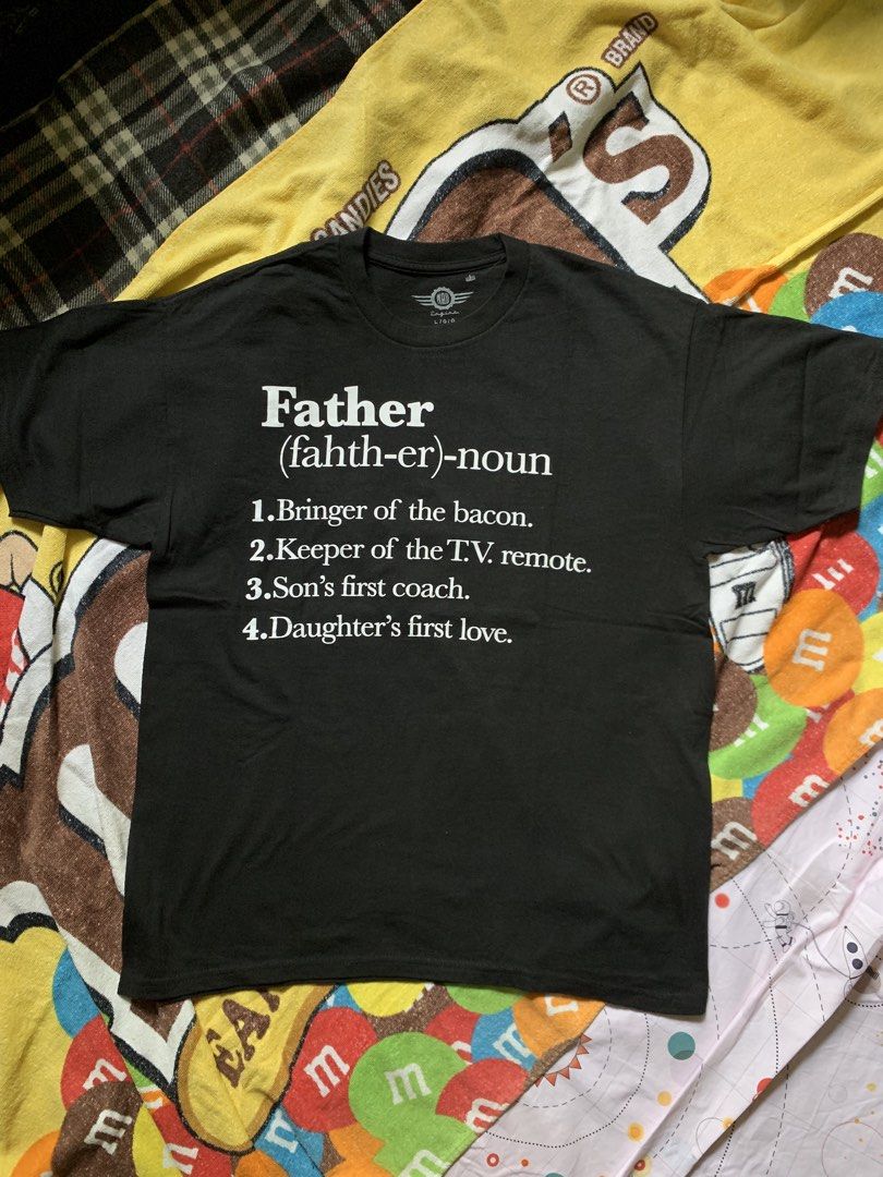 Modern "father" statement tee (Category: Tshirts & Polo Shirts ) located in Cagayan de Oro. Submitted by premium_thrifts (Listing ID 1460731622, Image 1). Description: Black colorway. Excellent condition. Issue: none - MEASUREMENTS: L27.5" x W21" 20" (shoulder to shoulder) 8" (sleeve length) Fits Large Add shipping fee (via JRS or J&T).