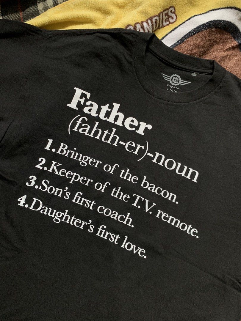 Modern "father" statement tee (Category: Tshirts & Polo Shirts ) located in Cagayan de Oro. Submitted by premium_thrifts (Listing ID 1460731622, Image 2). Description: Black colorway. Excellent condition. Issue: none - MEASUREMENTS: L27.5" x W21" 20" (shoulder to shoulder) 8" (sleeve length) Fits Large Add shipping fee (via JRS or J&T).