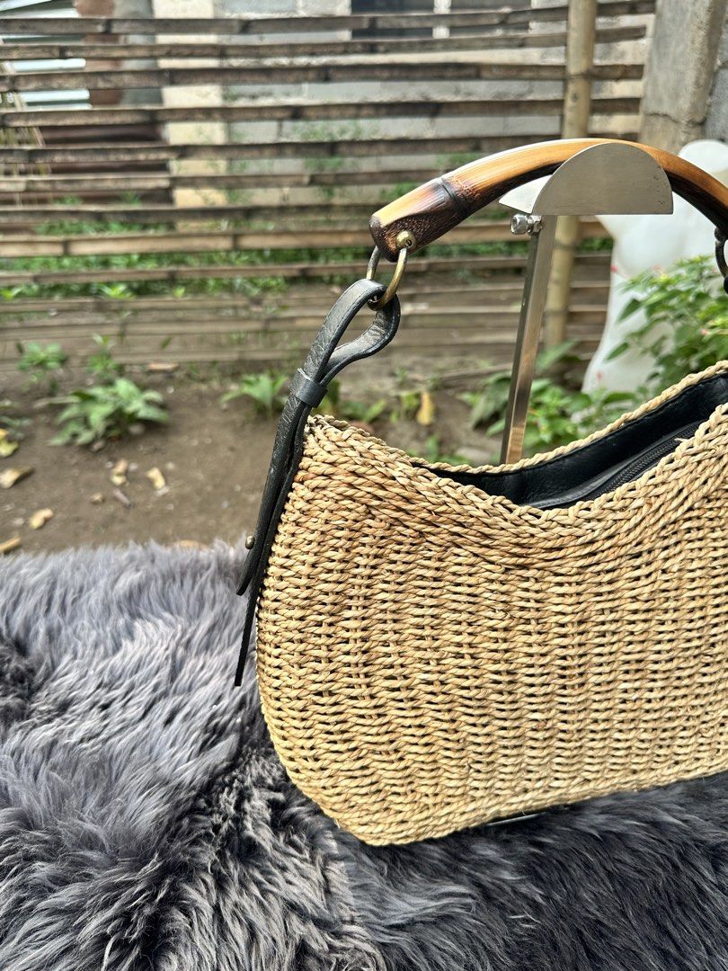 Mombasa Bamboo handle Knitted Bag. (Category: Shoulder Bags) located in Cagayan de Oro. Submitted by kjcartier26 (Listing ID 1460863453, Image 2). Description: - Made in Italy. 😱 - Flawless, In good condition - Clean inside/Outside, Corners, Zippers. - Has minimal Powderize Bottom part, But still doesn’t affect the Precious bag. - Zipper Needs Cleaning..