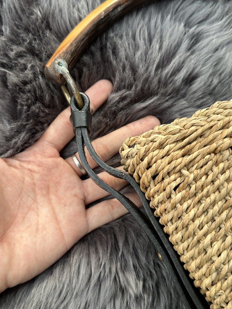 Mombasa Bamboo handle Knitted Bag. (Category: Shoulder Bags) located in Cagayan de Oro. Submitted by kjcartier26 (Listing ID 1460863453, Image 3). Description: - Made in Italy. 😱 - Flawless, In good condition - Clean inside/Outside, Corners, Zippers. - Has minimal Powderize Bottom part, But still doesn’t affect the Precious bag. - Zipper Needs Cleaning..