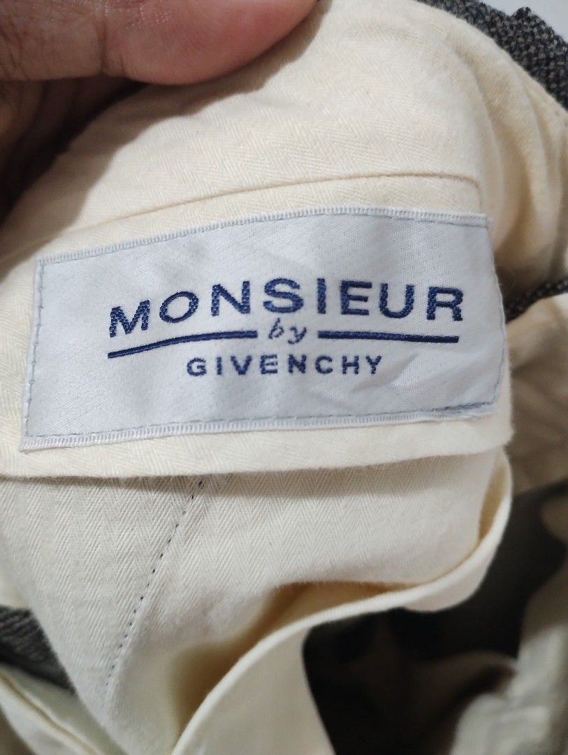 Monsieur by Givenchy Wool Blend Trousers (Category: Trousers) located in Imus. Submitted by darylg88358770 (Listing ID 1460735835, Image 3). Description: - Classic wool blend trousers from Monsieur by Givenchy. - Dark brown/grey speckled fabric. - Button closure with zip fly. - Two back pockets, one with a button. - Made in Japan. - Perfect for smart casual or formal occasions. the items trifted fresh from bale need wash dimes 32w 38.5l good cond