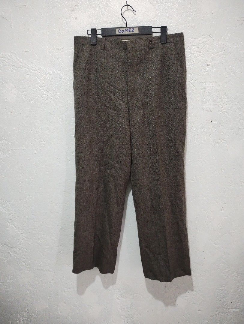 Monsieur by Givenchy Wool Blend Trousers (Category: Trousers) located in Imus. Submitted by darylg88358770 (Listing ID 1460735835, Image 1). Description: - Classic wool blend trousers from Monsieur by Givenchy. - Dark brown/grey speckled fabric. - Button closure with zip fly. - Two back pockets, one with a button. - Made in Japan. - Perfect for smart casual or formal occasions. the items trifted fresh from bale need wash dimes 32w 38.5l good cond
