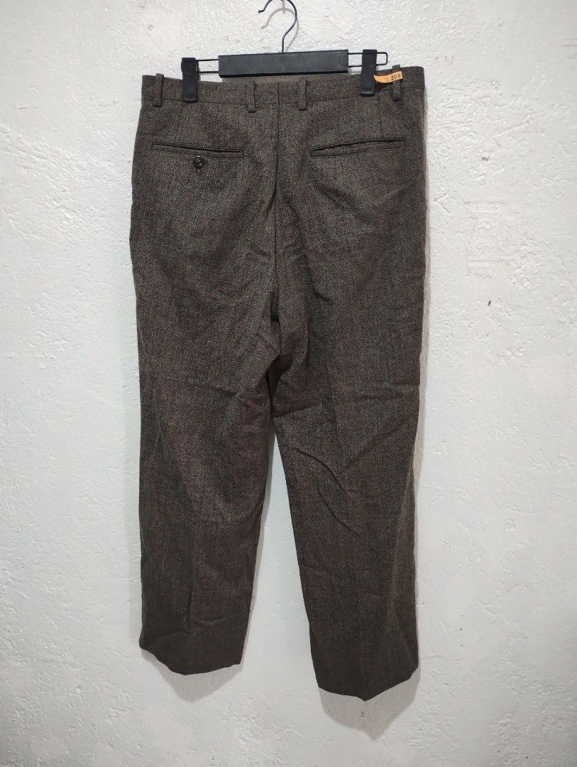 Monsieur by Givenchy Wool Blend Trousers (Category: Trousers) located in Imus. Submitted by darylg88358770 (Listing ID 1460735835, Image 2). Description: - Classic wool blend trousers from Monsieur by Givenchy. - Dark brown/grey speckled fabric. - Button closure with zip fly. - Two back pockets, one with a button. - Made in Japan. - Perfect for smart casual or formal occasions. the items trifted fresh from bale need wash dimes 32w 38.5l good cond