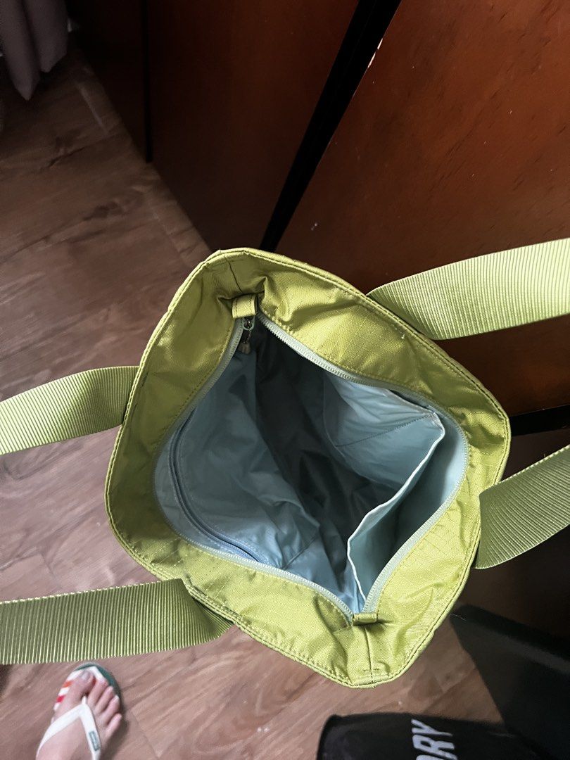 Mont-bell Tote Bag - Green (Category: Tote Bags) located in Manila. Submitted by binigurrl (Listing ID 1460798753, Image 2). Description: - Mont-bell tote bag in a stylish green color. - Features a secure zippered main compartment. - Includes a convenient small inner pocket for essentials. - Equipped with durable, sturdy handles for comfortable carrying. - Ideal for everyday errands or your next travel adventure..
