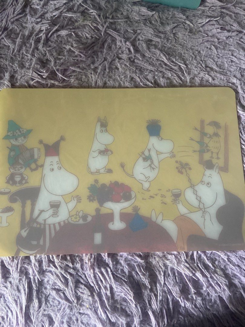 Moomin Characters Yellow Cutting Board (Category: Craft Supplies & Tools) located in Davao. Submitted by mengsmixitems (Listing ID 1460782291, Image 2). Description: - Adorable Moomin characters design - Bright yellow color - Perfect size for everyday use (approx. 20cm x 30cm) - Made from durable, long-lasting material - Ideal for all your food preparation needs - Adds a fun and cheerful touch to your kitchen.