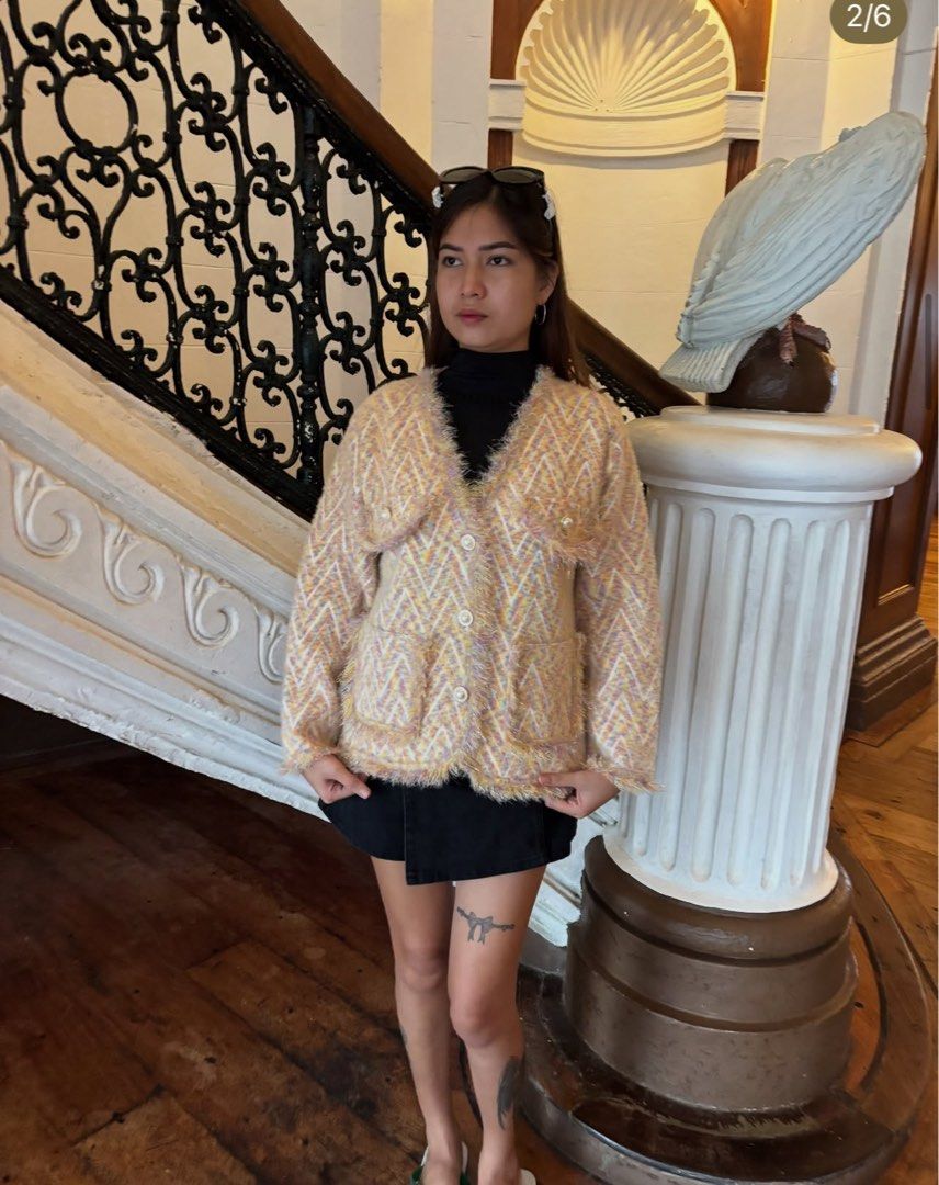 Moschino Couture! Knit Cardigan (Category: Coats, Jackets and Outerwear) located in Alcala. Submitted by dela.sole (Listing ID 1460724058, Image 2). Description: - Moschino Couture knit cardigan - Fuzzy texture with a chevron pattern - Pastel colors: yellow, pink, and purple - Two front pockets - Pearl button closure - Super cozy and chic - Great for layering.
