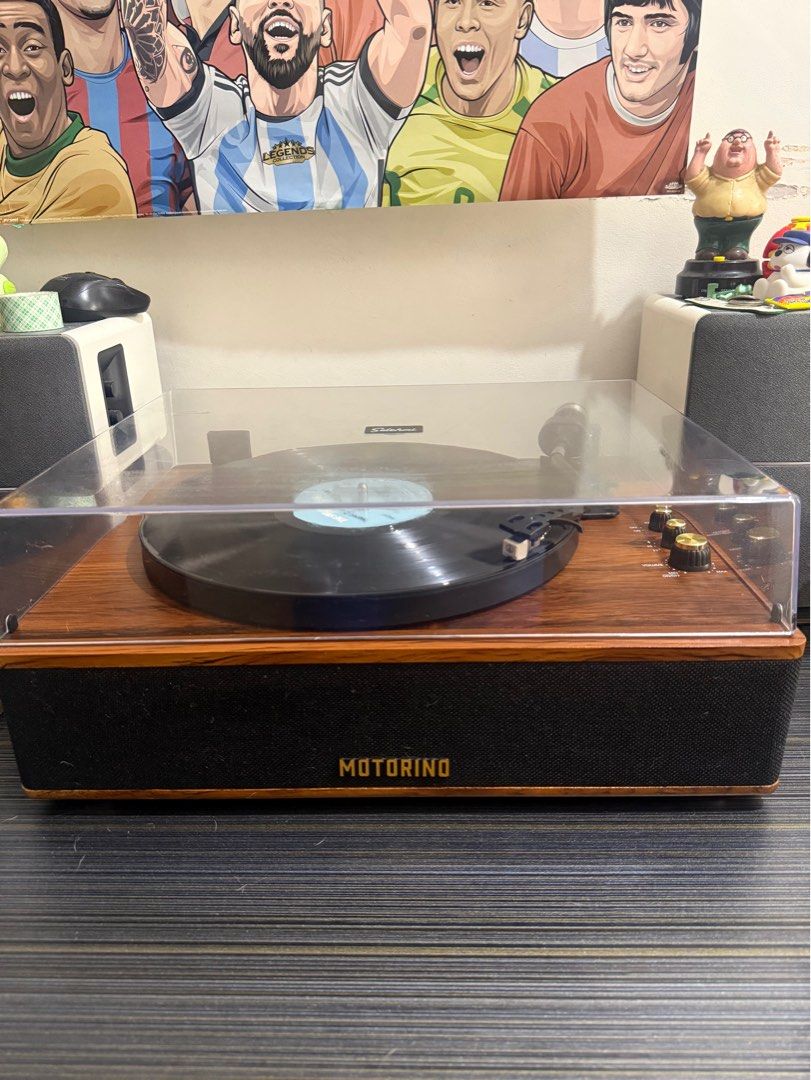 Motorino MK4 Turntable for sale (Category: Soundbars, Speakers & Amplifiers) located in Manila. Submitted by janbeeee14 (Listing ID 1460792713, Image 2). Description: 🎶 Motorino Turntable – Vintage Style For sale: Motorino turntable in very good condition, complete with its original box. Beautiful wood-finish cabinet with built-in stereo speakers, perfect for vinyl collectors or anyone looking for a stylish vintage-inspired record player. Featur
