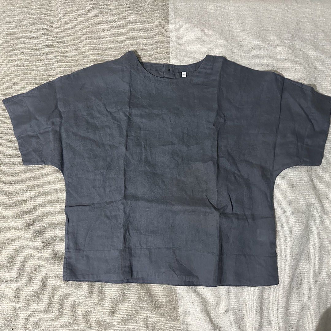 Muji 100% Linen Top (Category: Blouses) located in Manila. Submitted by mjoycie (Listing ID 1460880789, Image 1). Description: - Uniqlo Grey Linen Blend Top - Short Sleeves - Relaxed Fit - Button Closure at Back Neck - Made in Cambodia - Ideal for Casual Wear or Layering - Easy to Style.